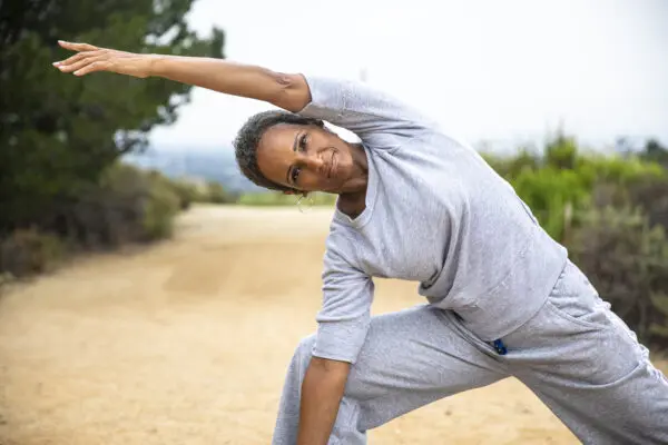Senior Black Woman Outdoor Yoga Fitness Lifestyle A senior black woman staying fit outdoors